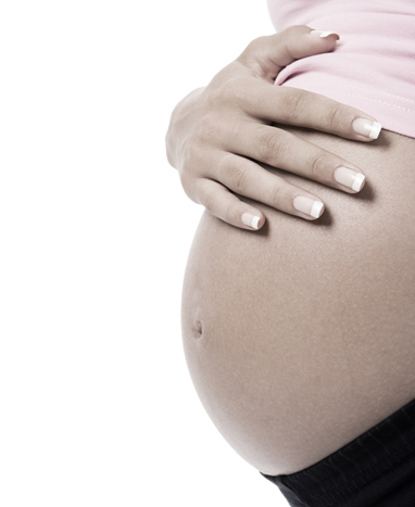 Hand on pregnany belly