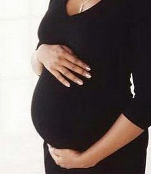 Pregnant woman in black