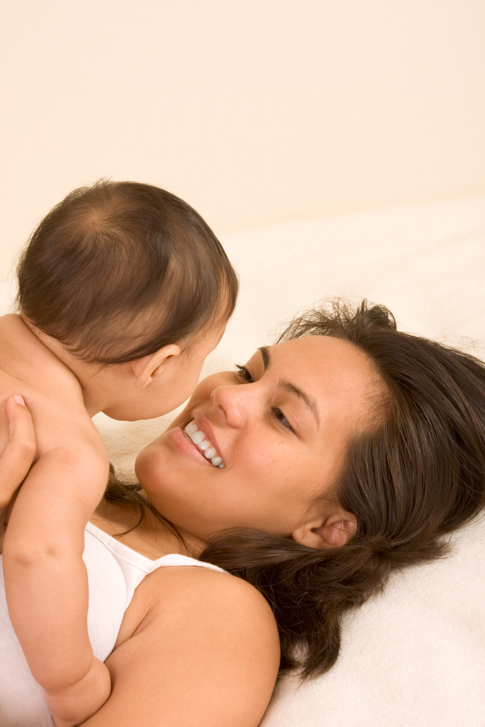 Mom smiling at baby