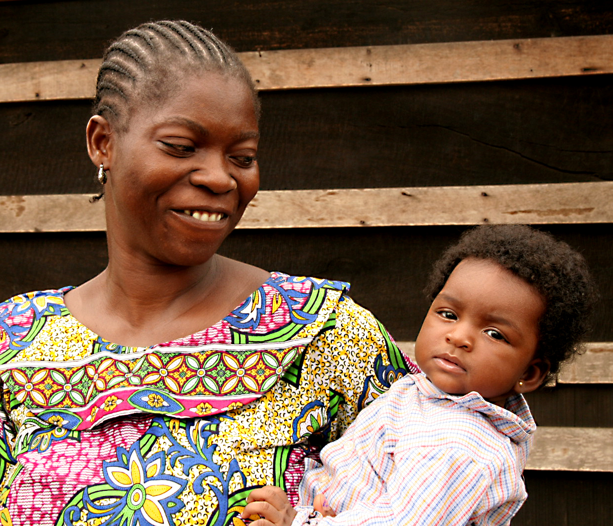 Woman smiling at baby