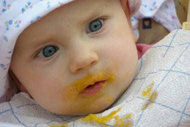 Baby with babyfood on face