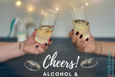 Two hands toasting drink glasses